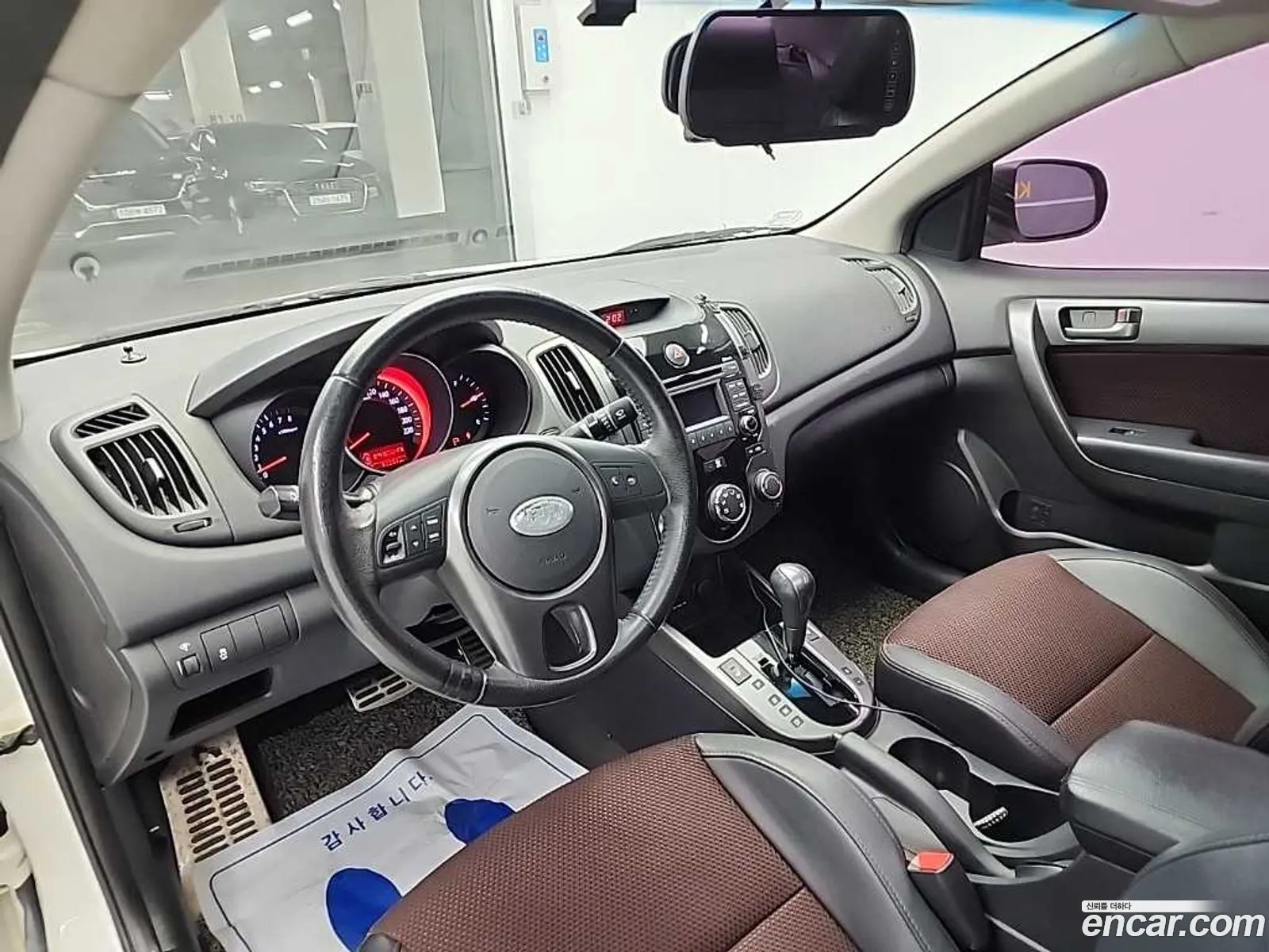 Kia Forte Koup 2010 — 11