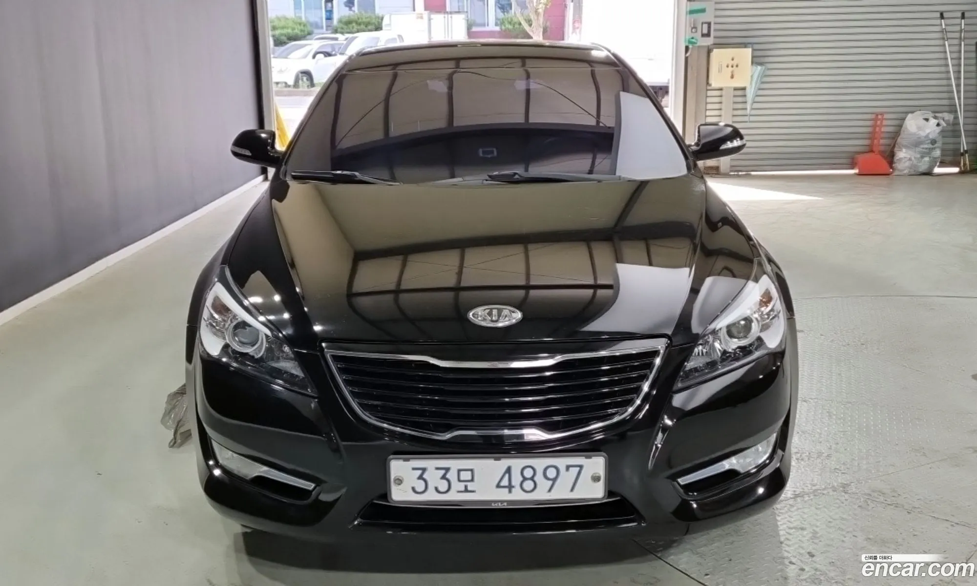 Kia K7 2011 — 12