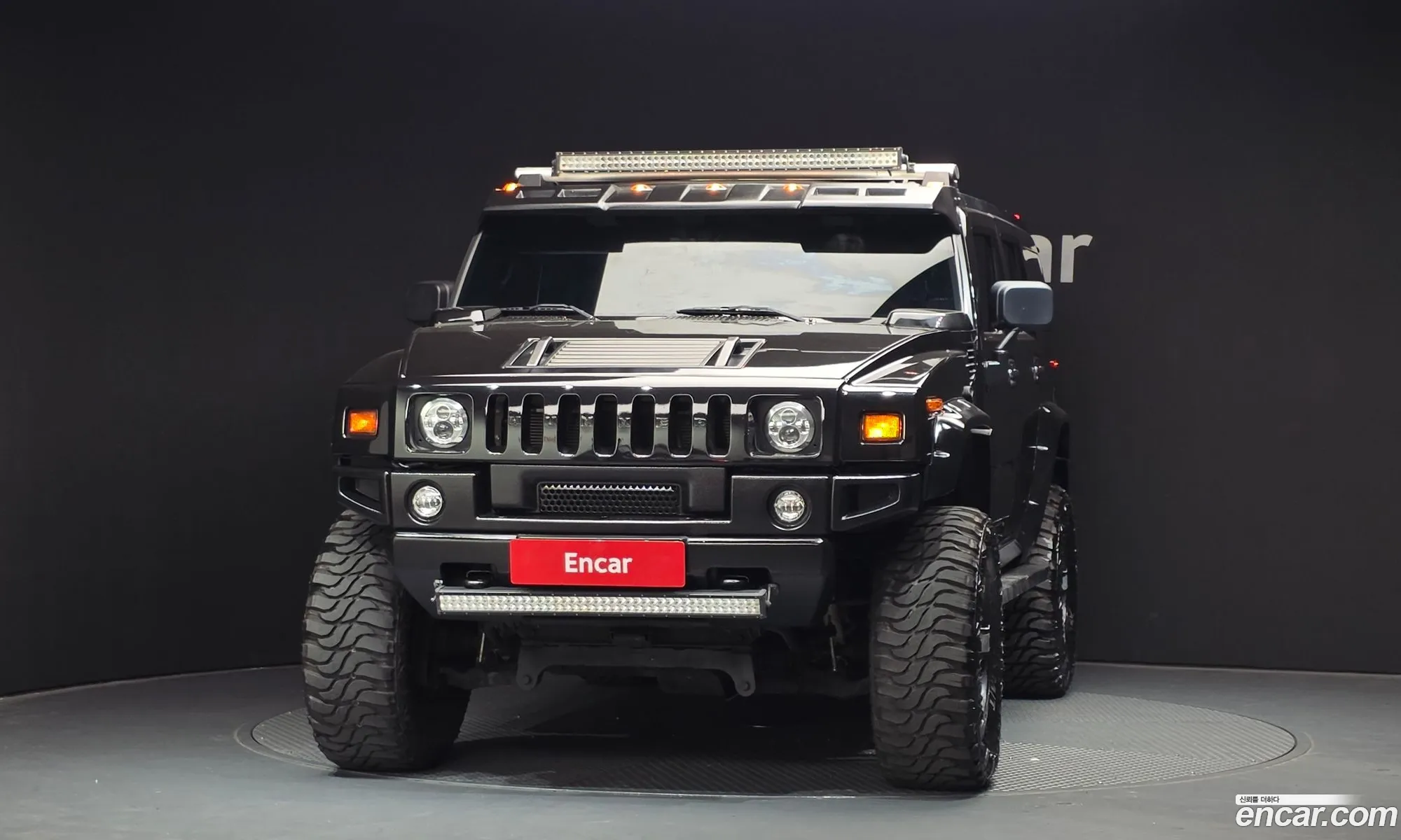 Hummer H2 2003 5GRGN23U53H144691 — 14