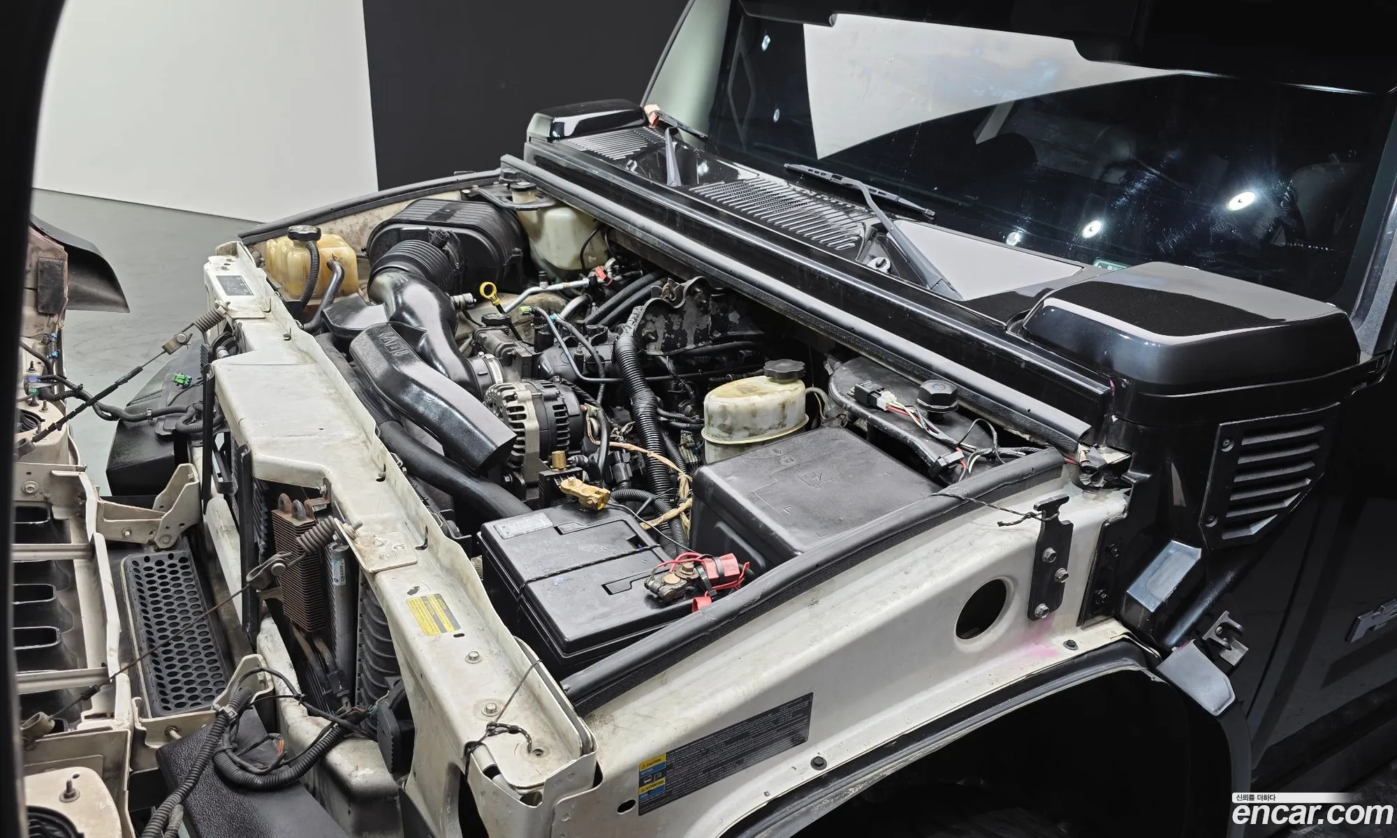Hummer H2 2003 5GRGN23U53H144691 — 16