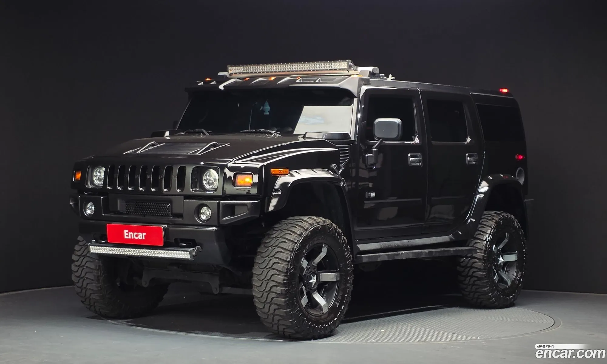 Hummer H2 2003 5GRGN23U53H144691 — 13
