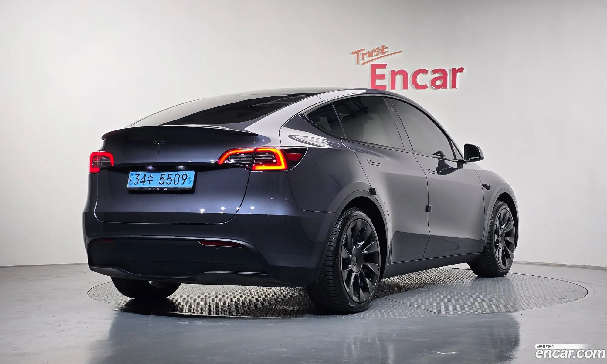Tesla Model Y 2023 LRWYGCFS5PC103798 — 31