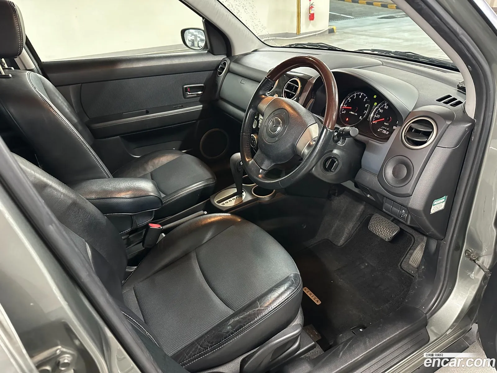 Mazda Verisa 2006 — 3