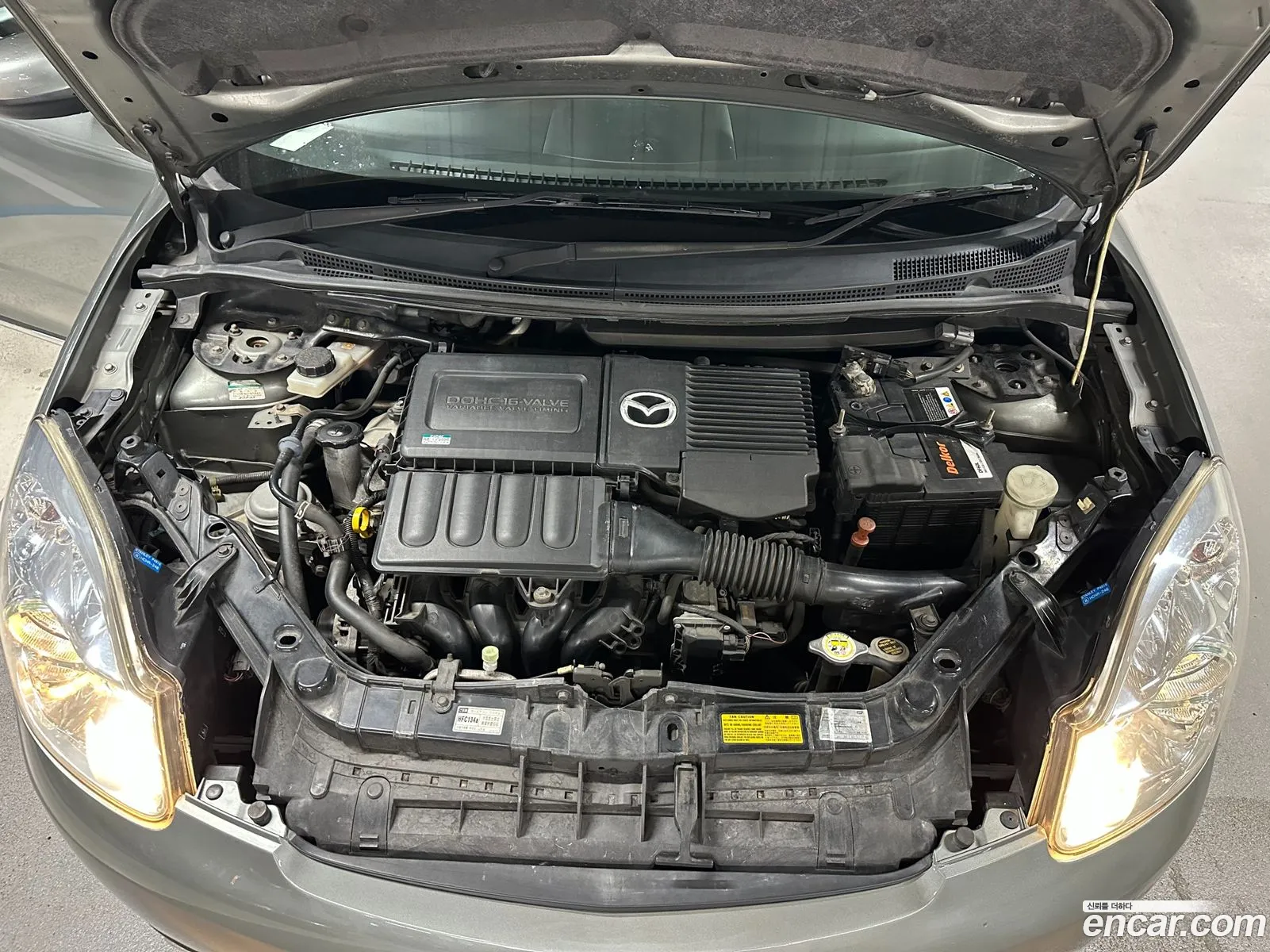 Mazda Verisa 2006 — 16