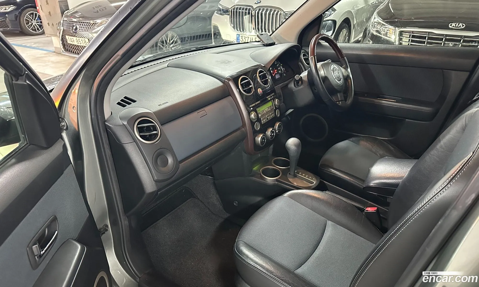 Mazda Verisa 2006 — 8