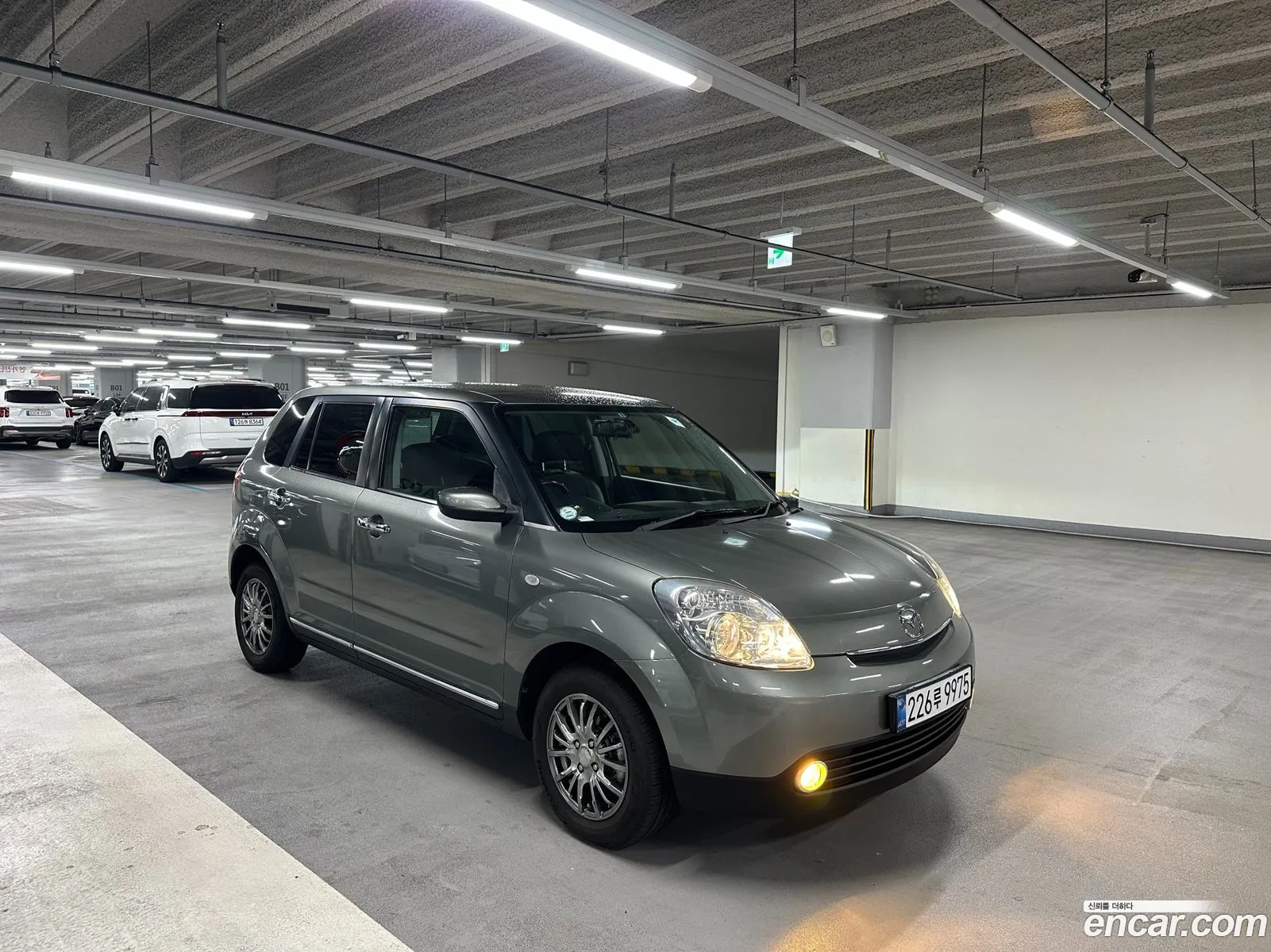 Mazda Verisa 2006 — 12