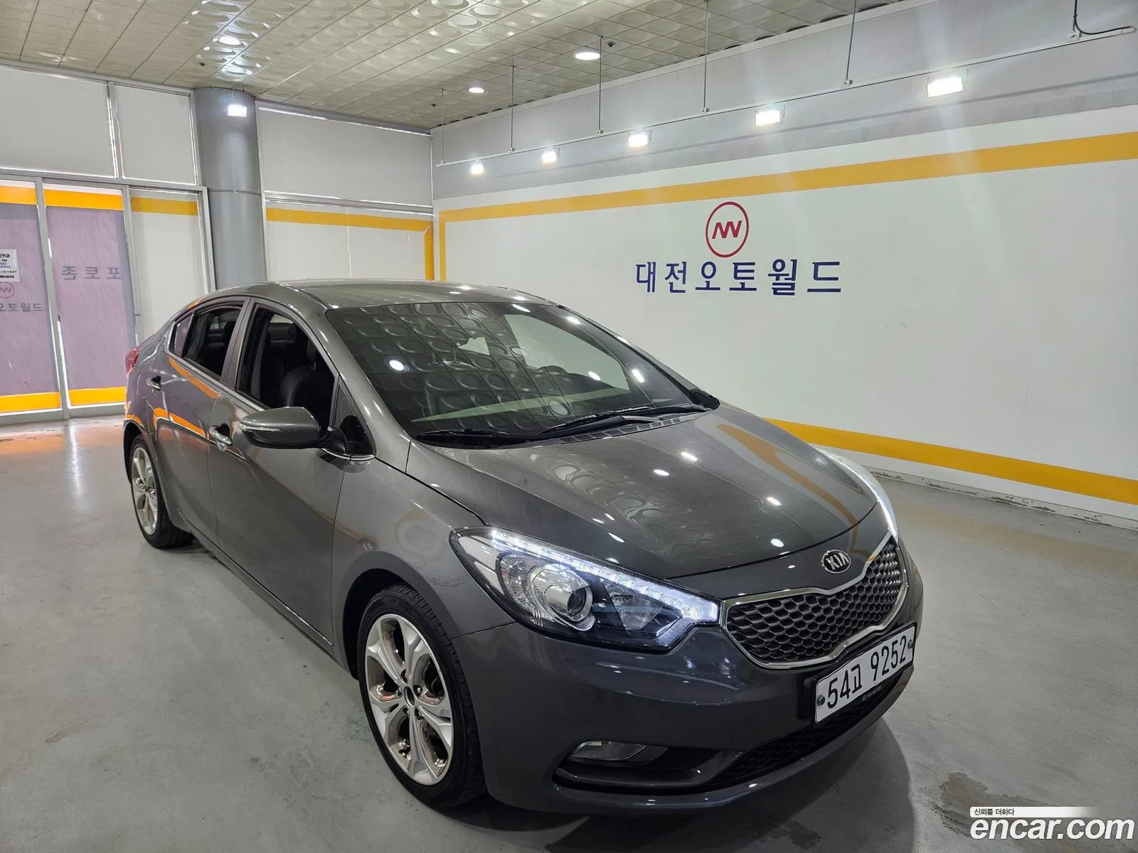 Kia K3 2012 — 12