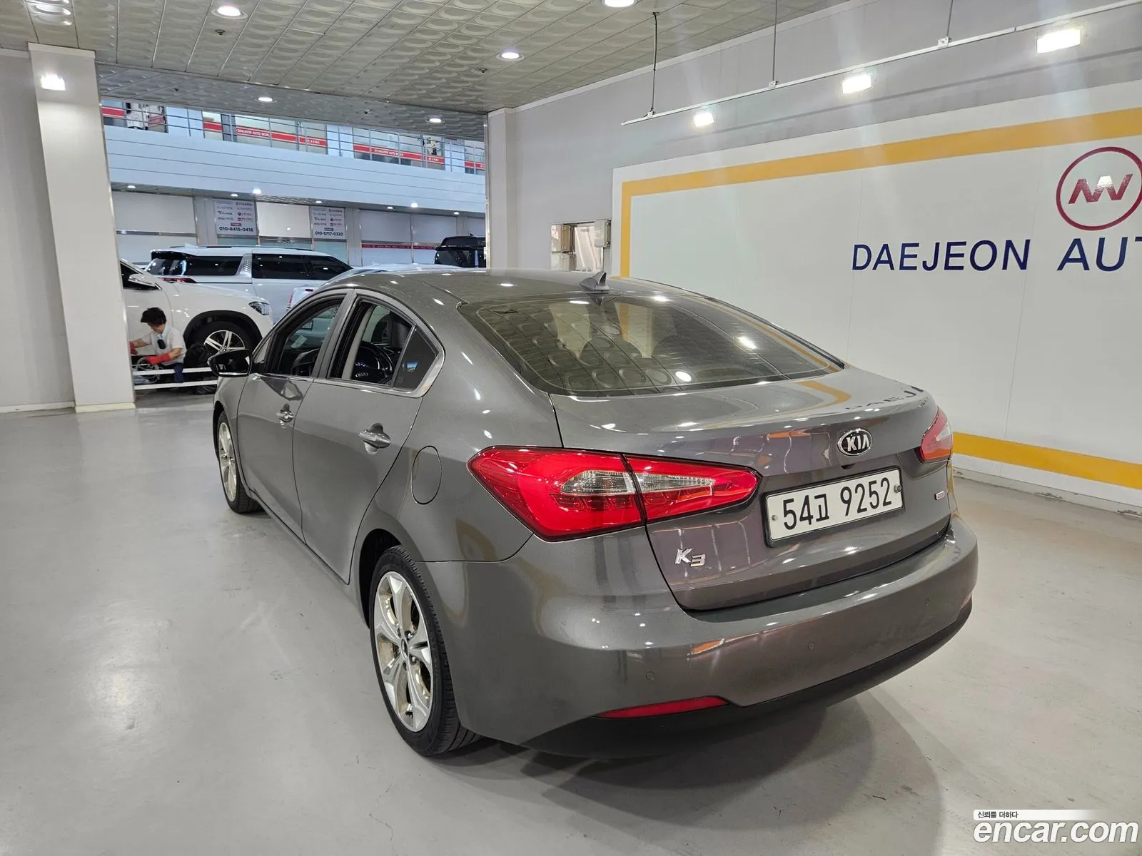 Kia K3 2012 — 3