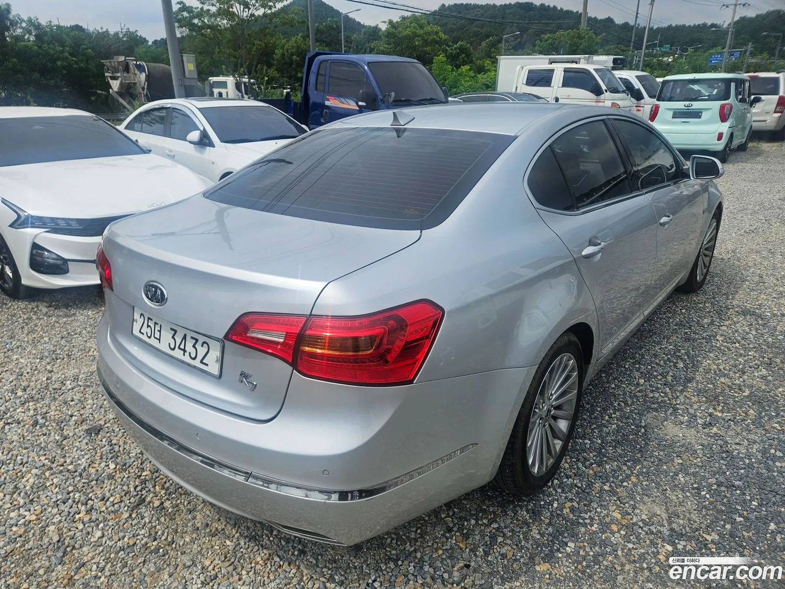 Kia K7 2010 — 7