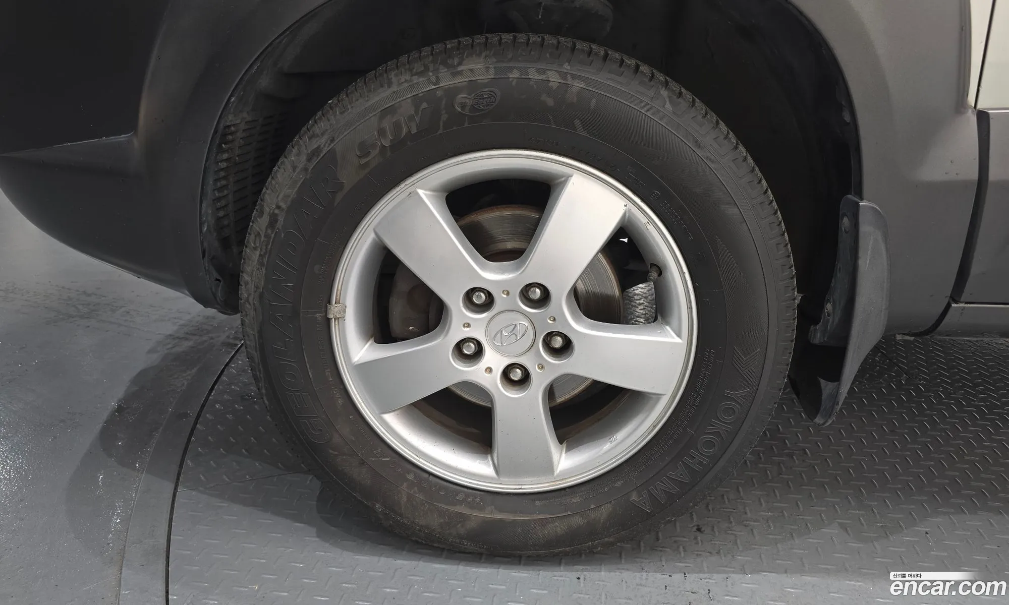 Hyundai Tucson 2005 KMHJM81VP5U130765 — 12
