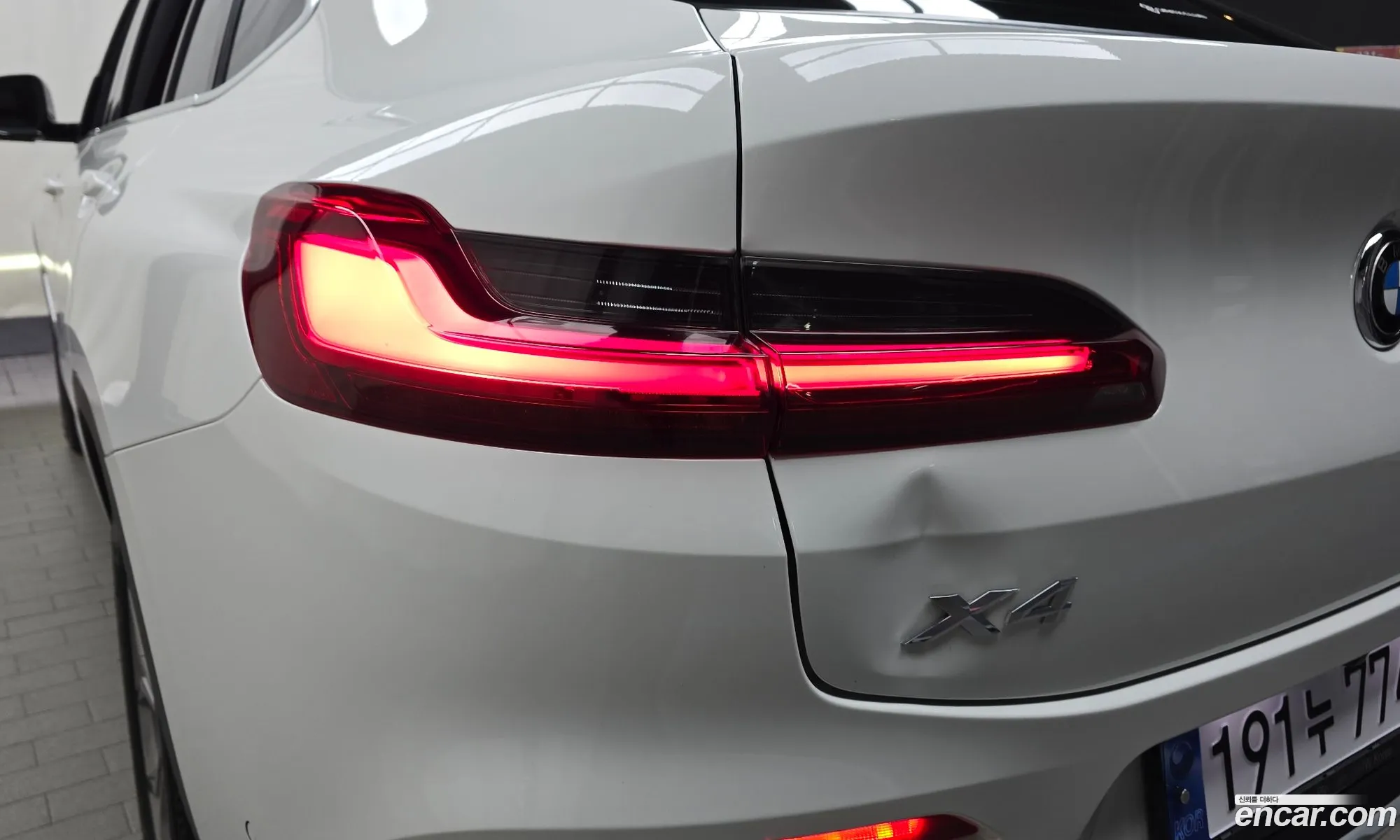 BMW X4 2021 WBAVJ9108M9F99043 — 3