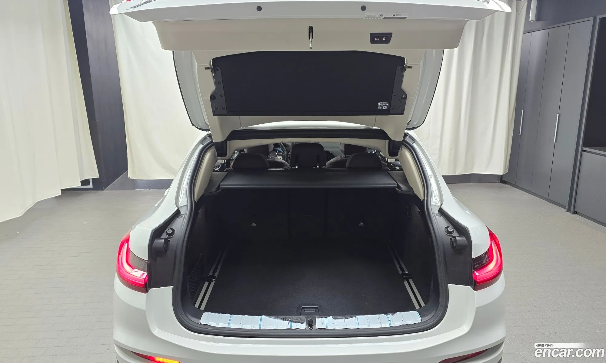 BMW X4 2021 WBAVJ9108M9F99043 — 32