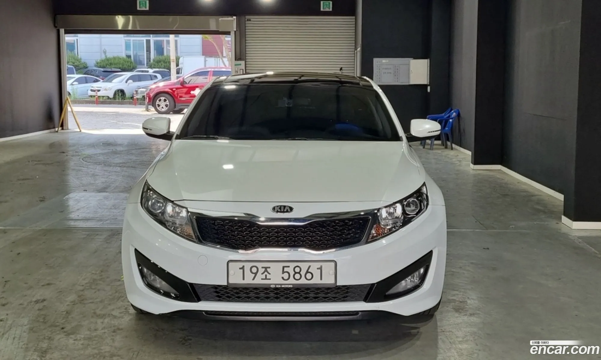 Kia K5 2010 — 2