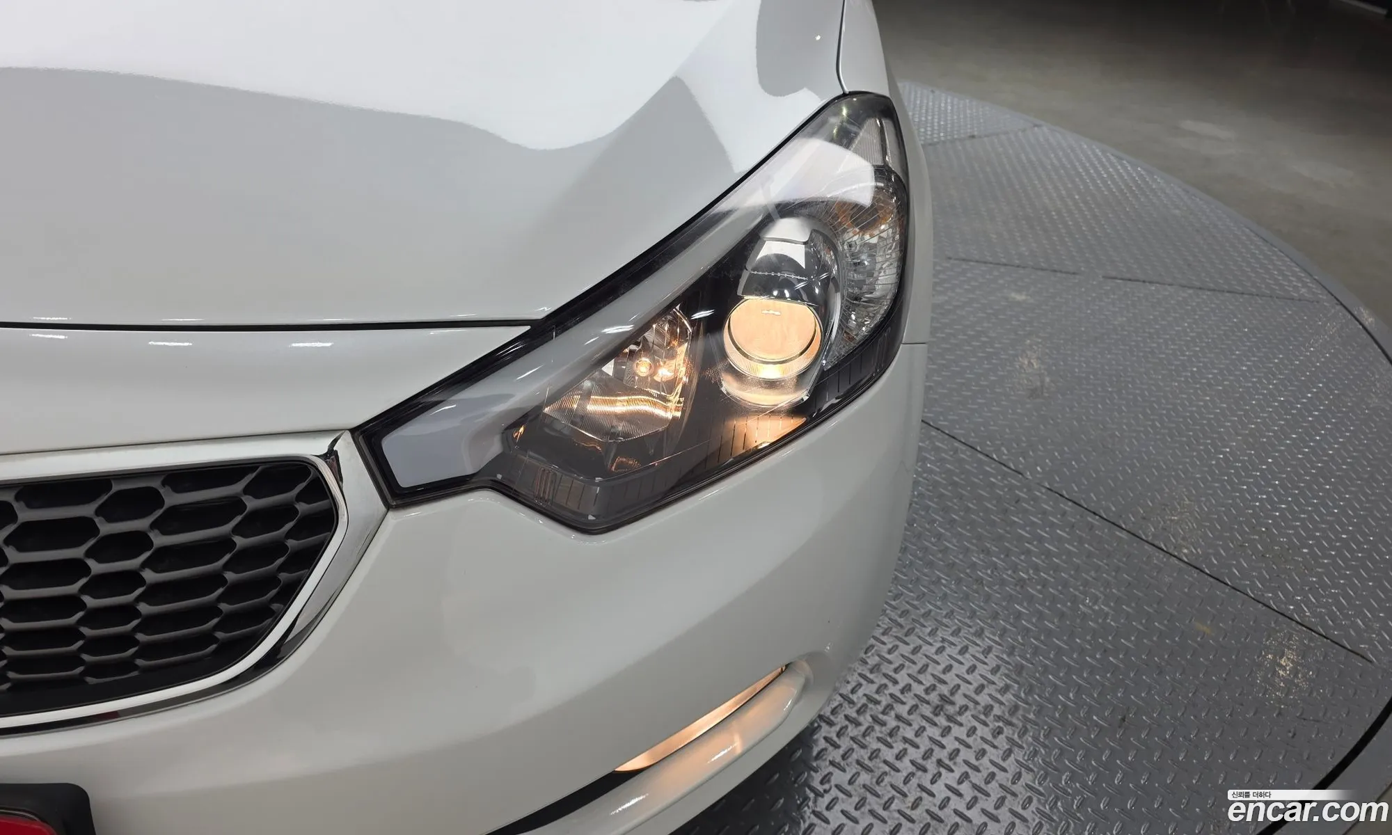 Kia K3 2014 — 15