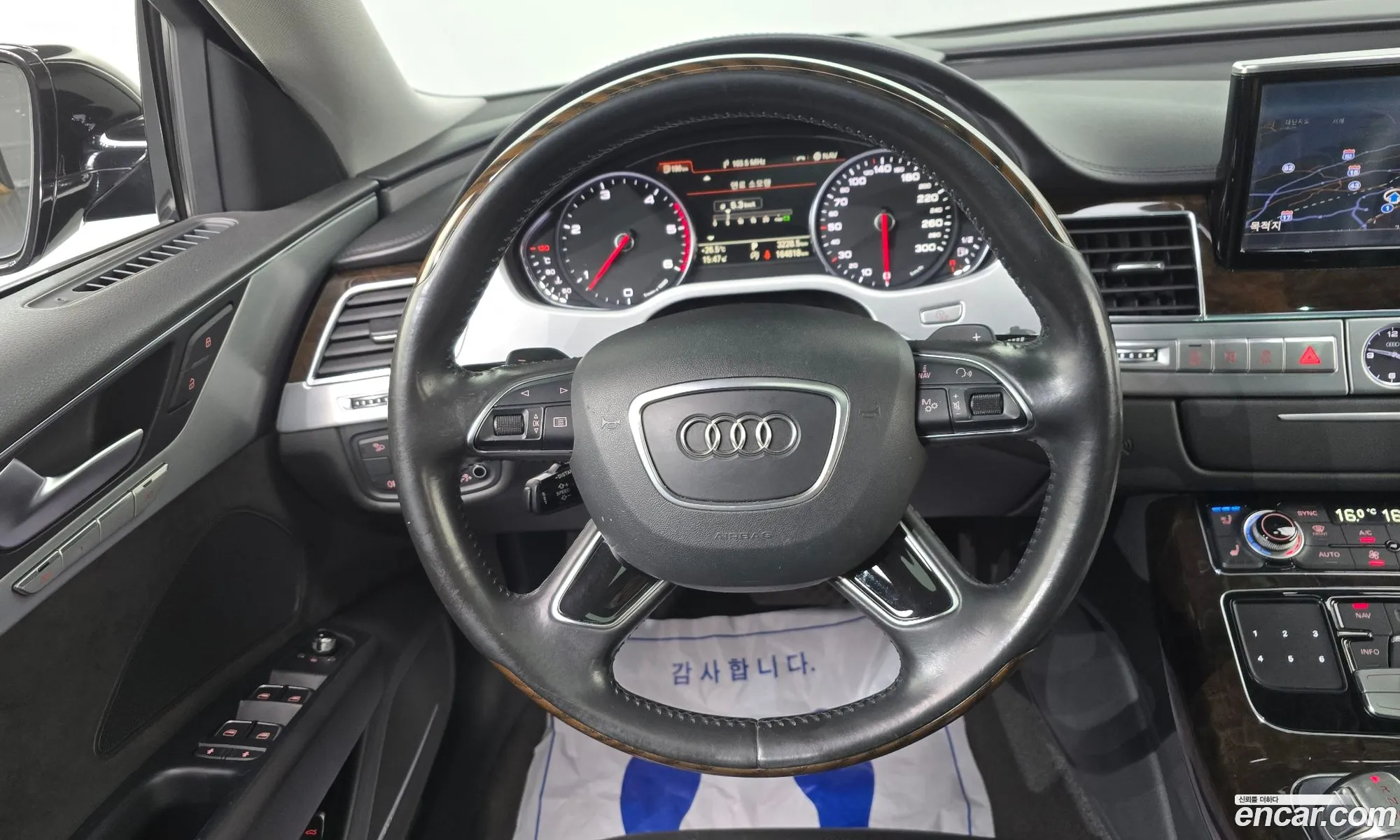 Audi A8 2015 WAUZZZ4H6FN027648 — 6