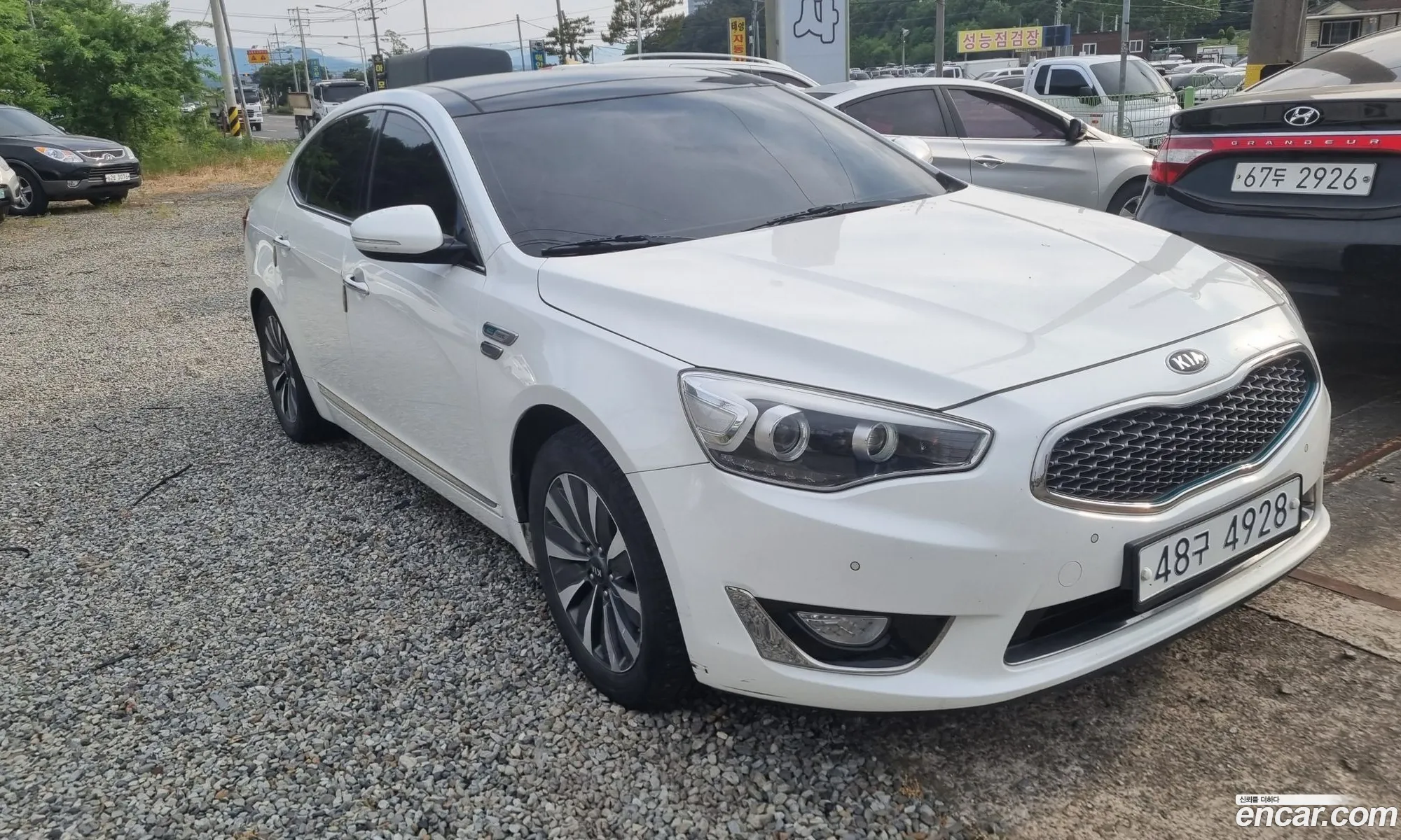 Kia K7 Hybrid 2014 — 2