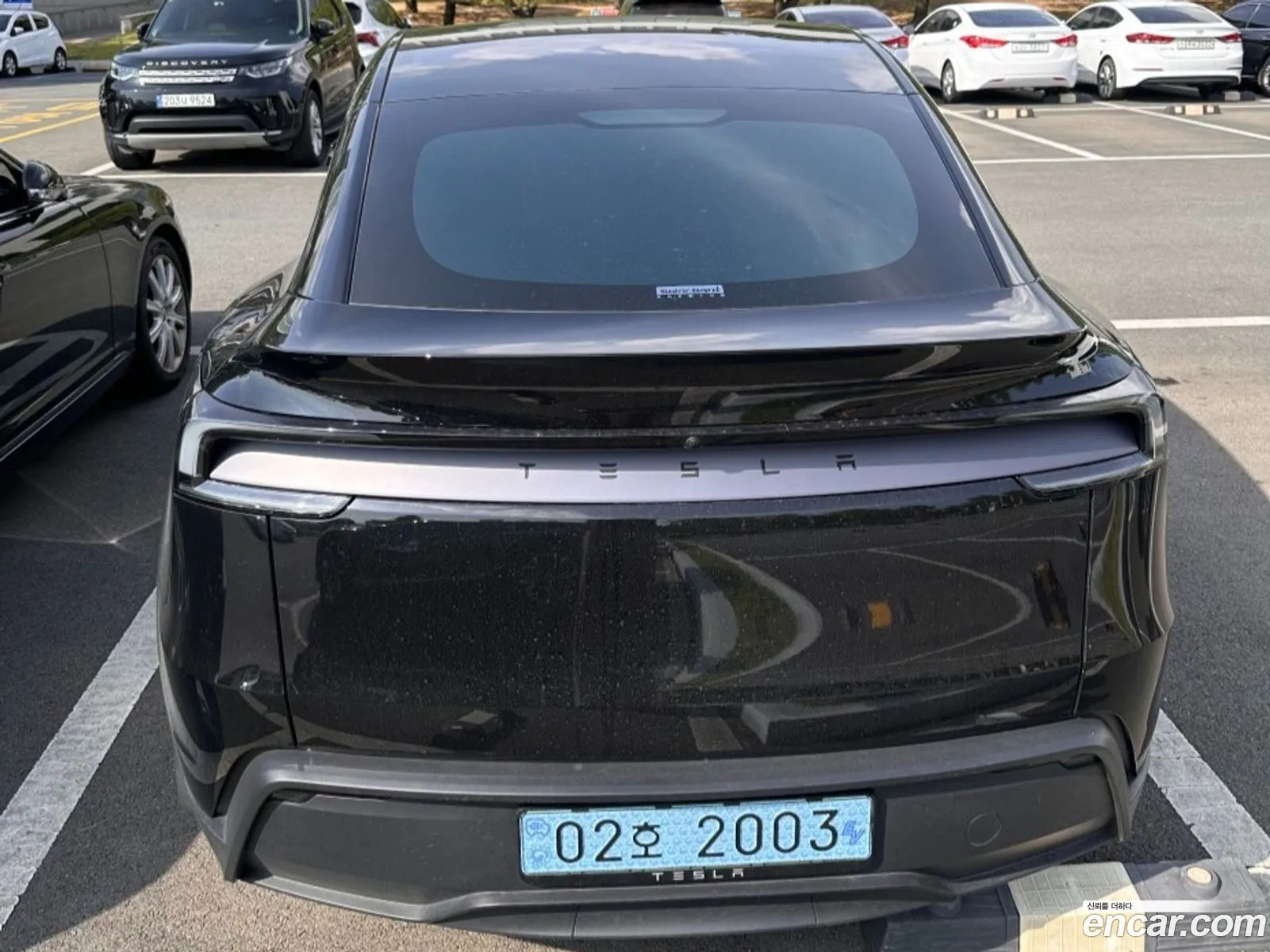 Tesla Model Y 2025 — 2