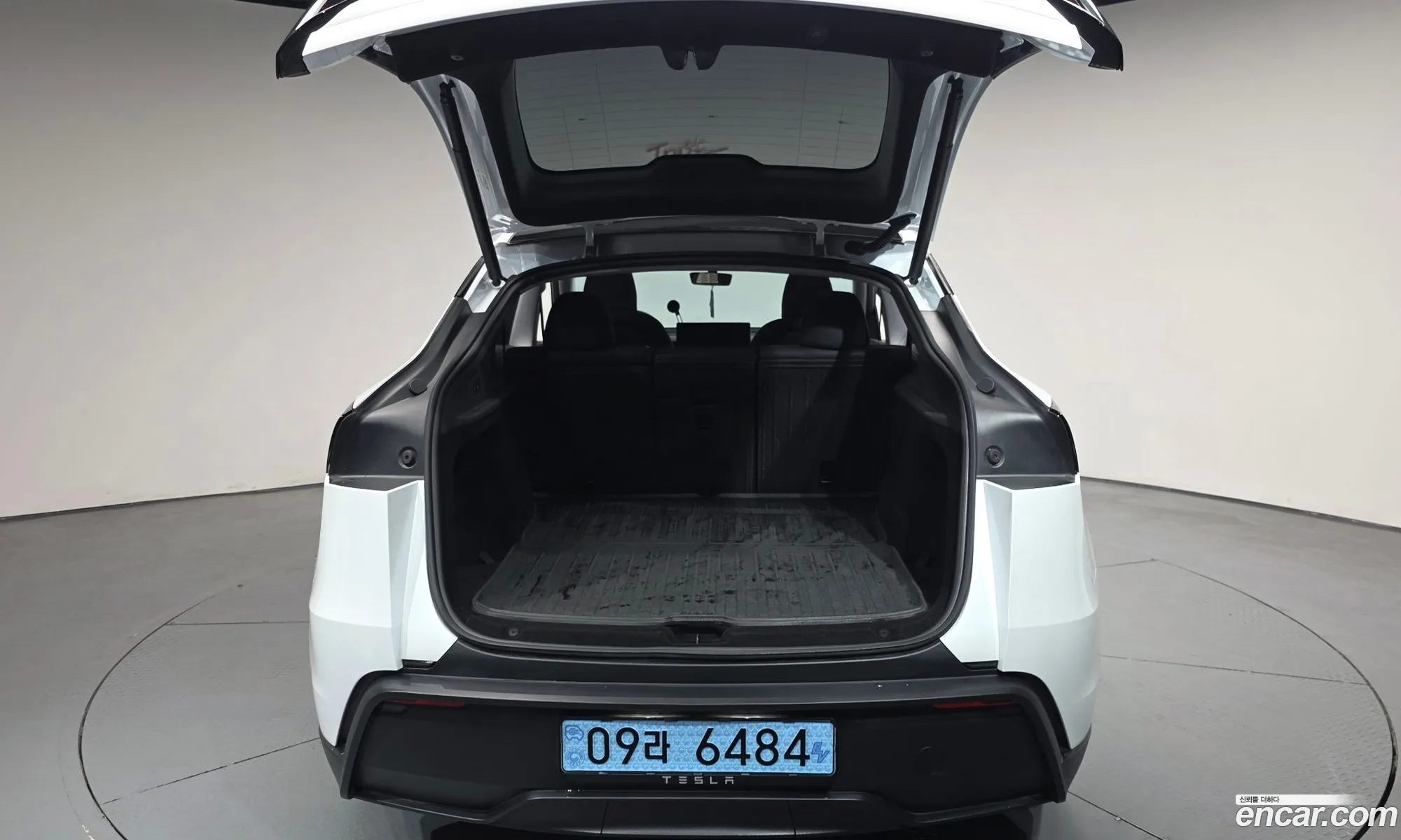 Tesla Model Y 2025 LRWYGCFJ9SC027390 — 4