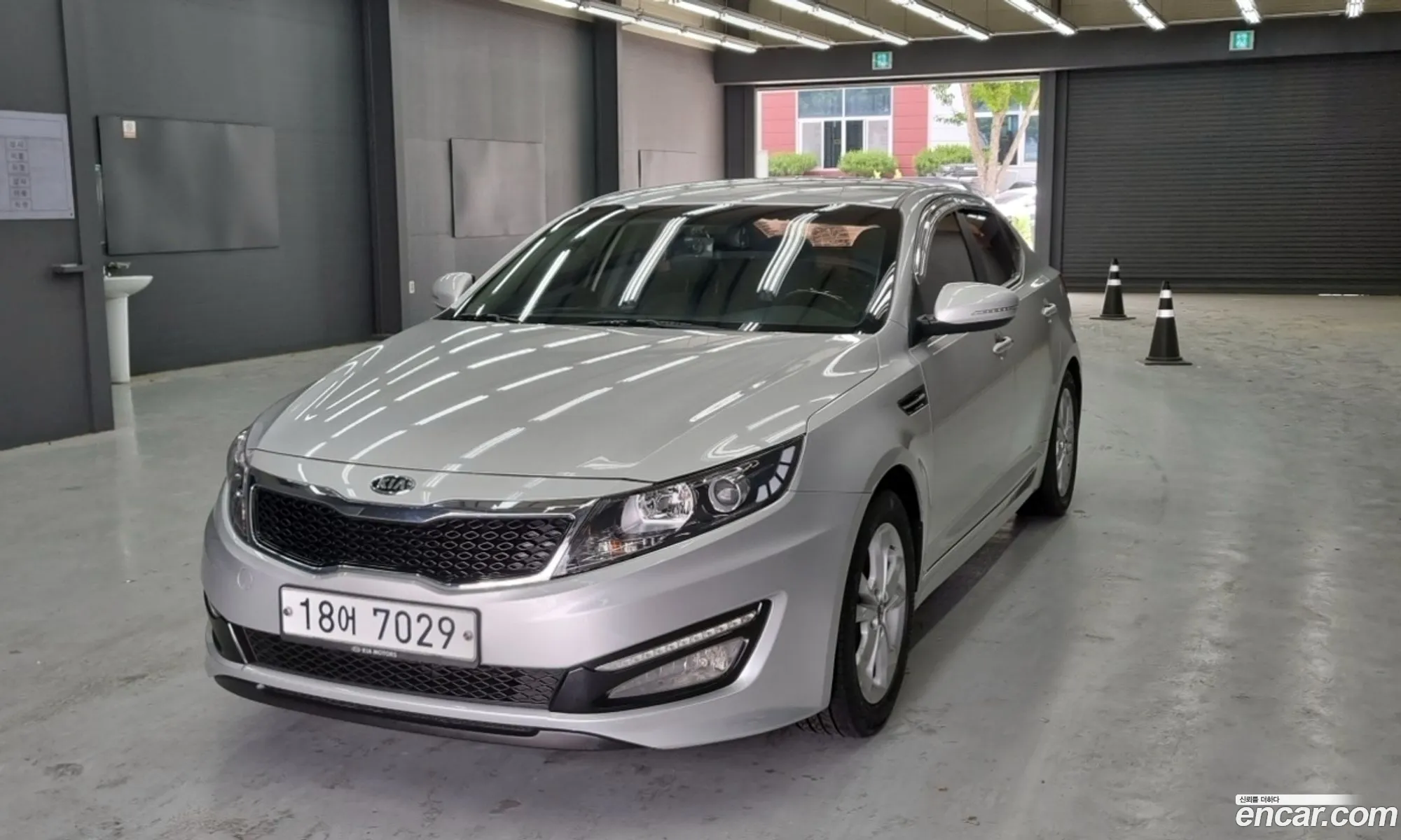 Kia K5 2010 — 2