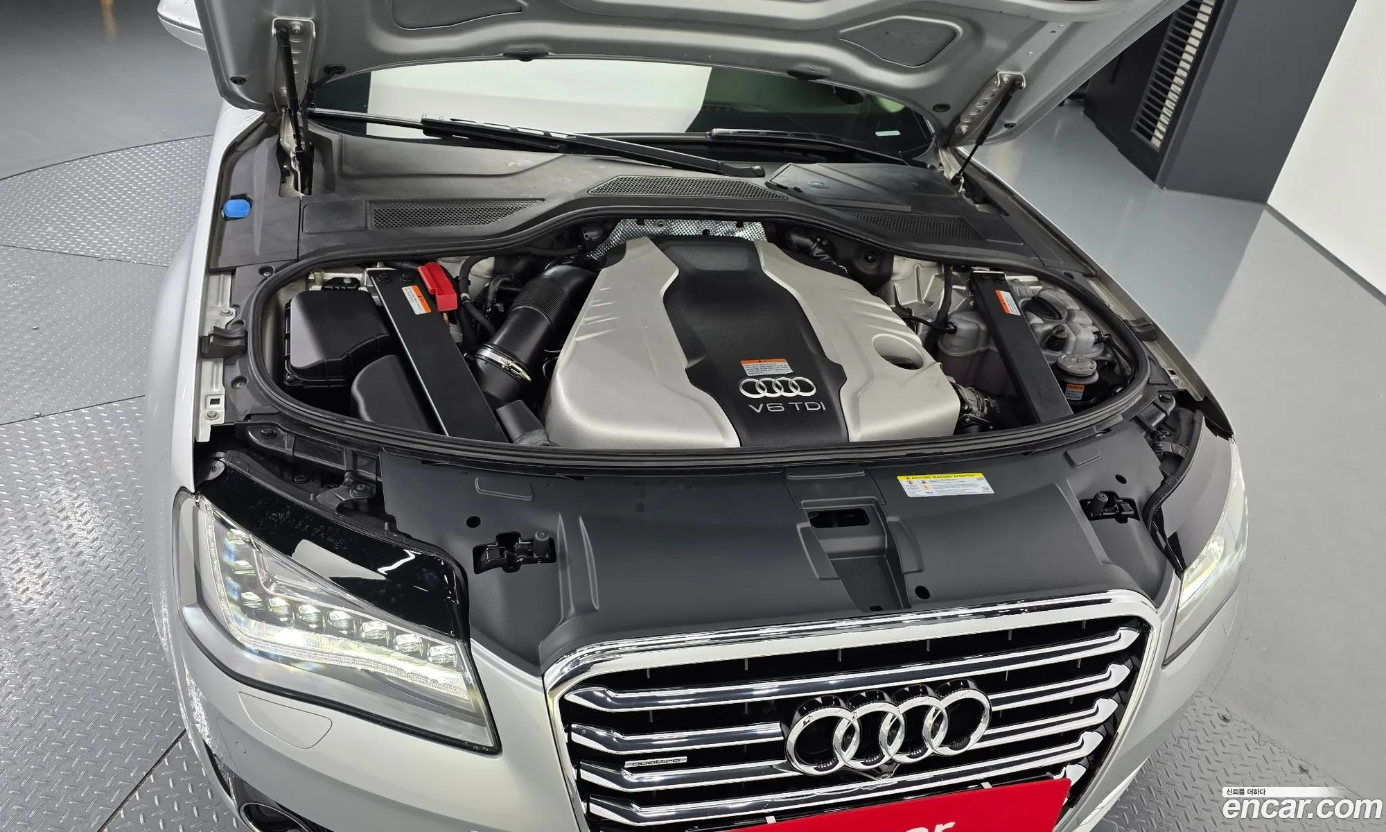 Audi A8 2012 WAUZZZ4HXCN030502 — 2