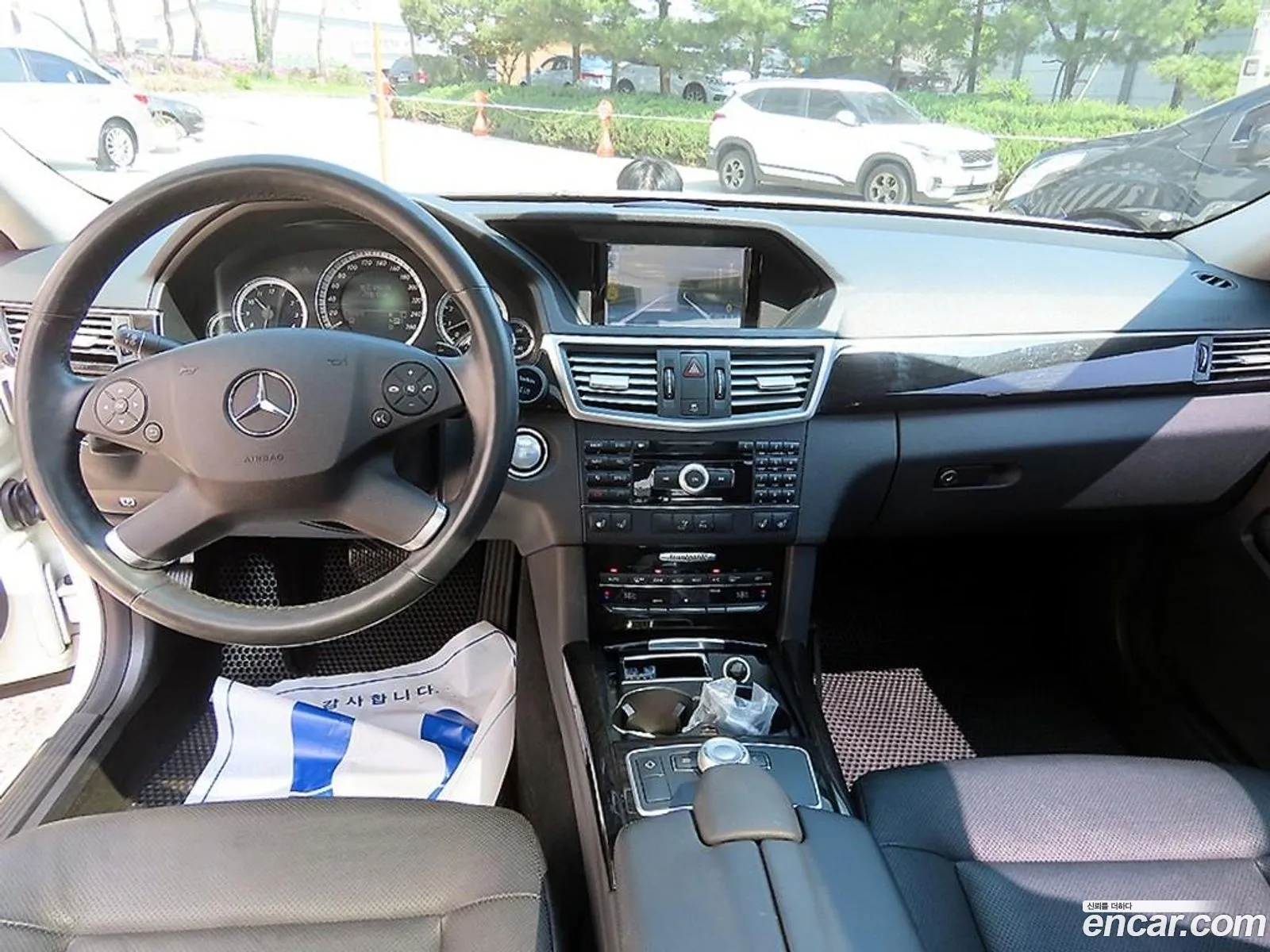Mercedes-Benz E-Class W212 2009 — 14