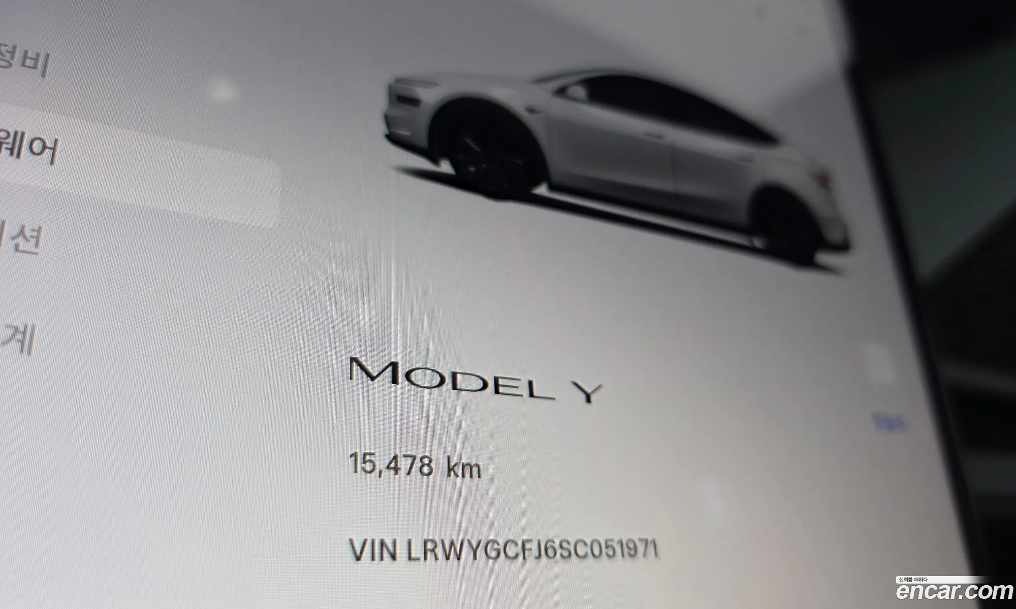 Tesla Model Y 2025 LRWYGCFJ6SC051971 — 26
