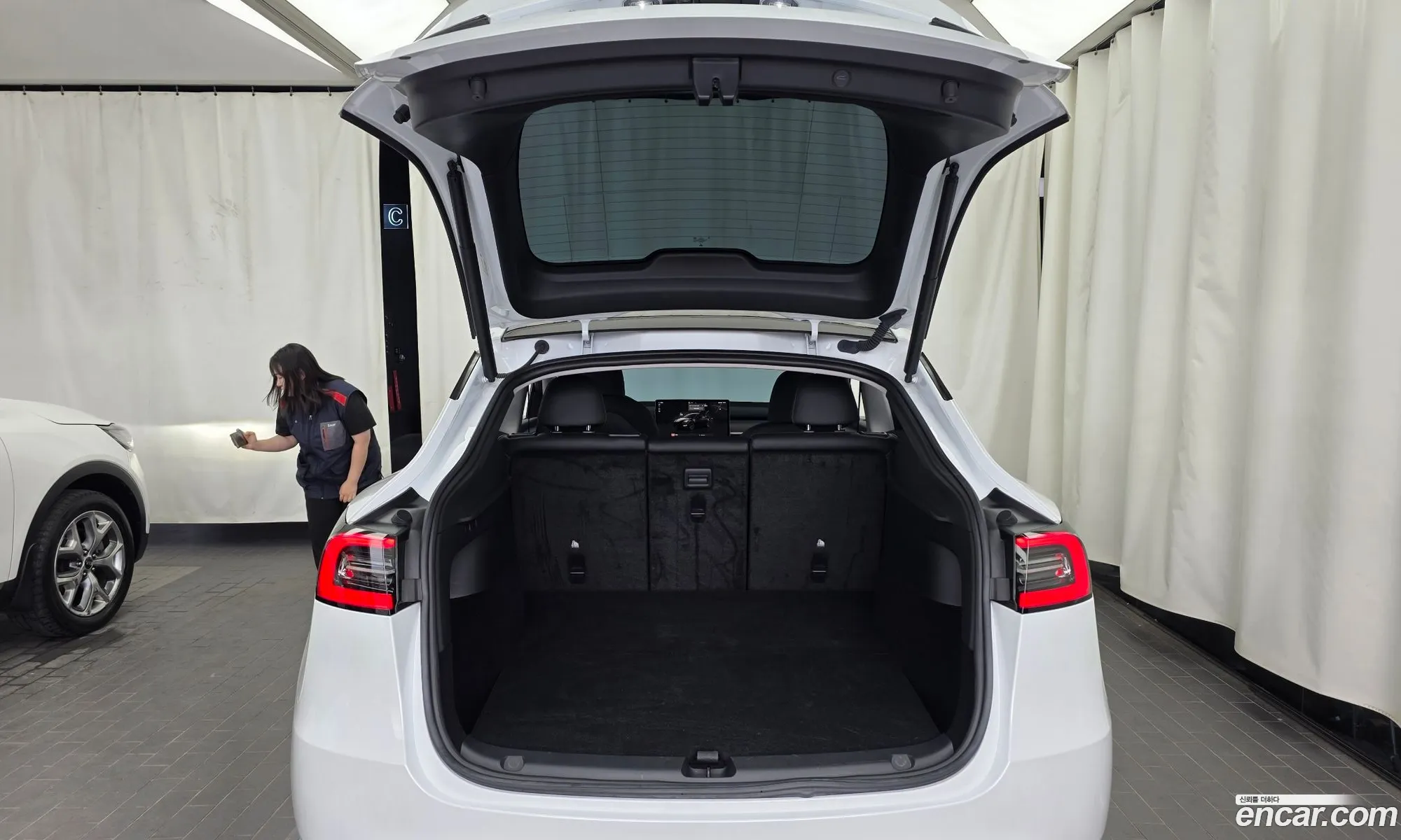 Tesla Model Y 2024 LRWYGCFSXRC552672 — 6