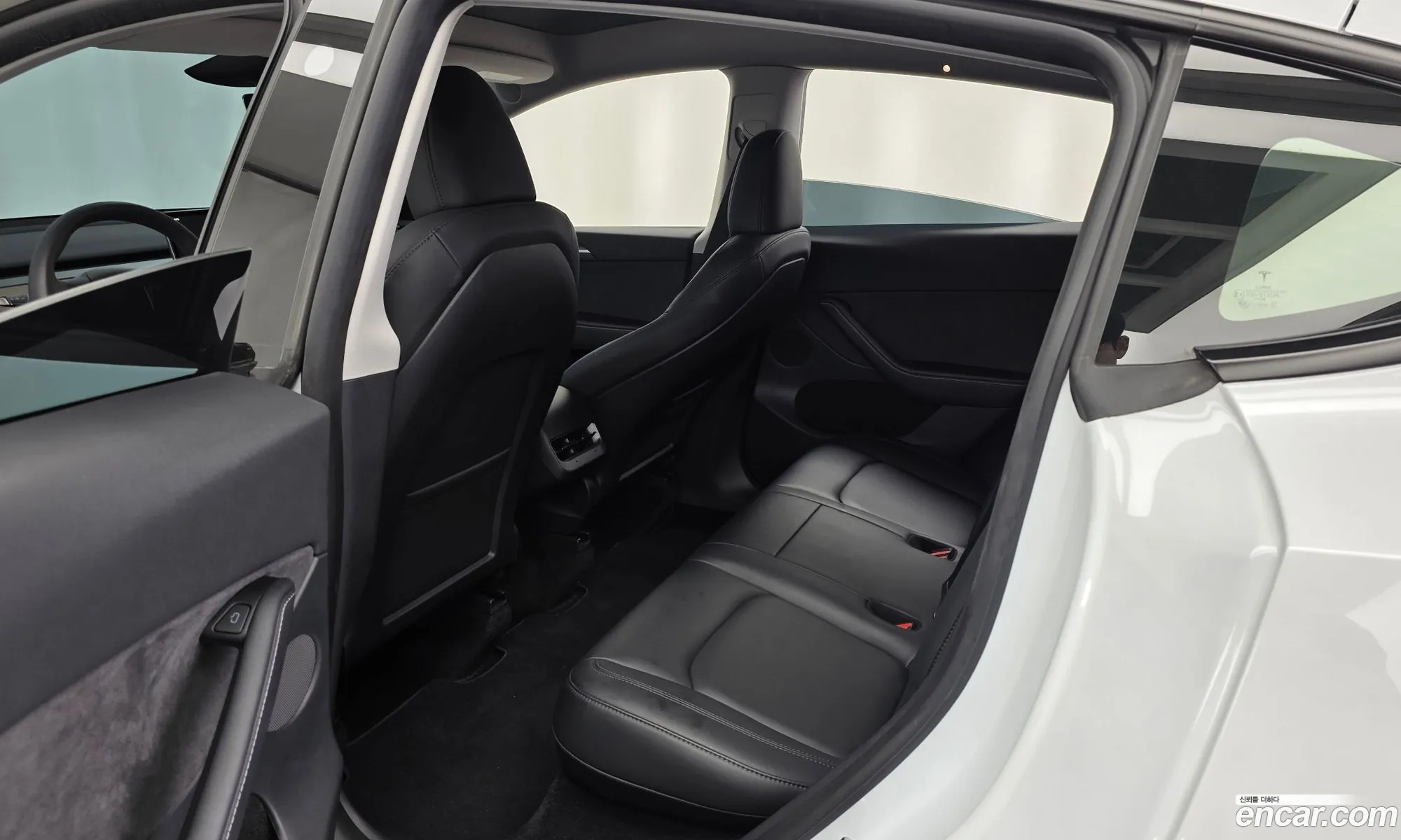 Tesla Model Y 2024 LRWYGCFSXRC552672 — 12