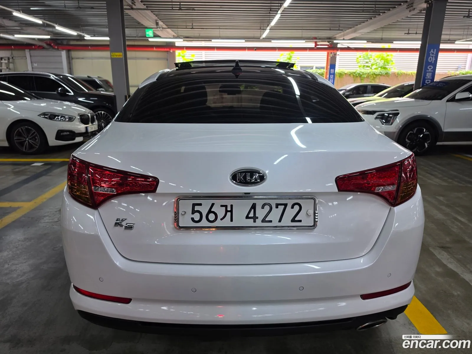 Kia K5 2010 — 2