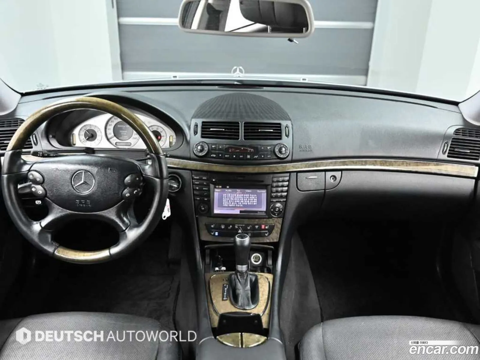 Mercedes-Benz E-Class W211 2009 — 16