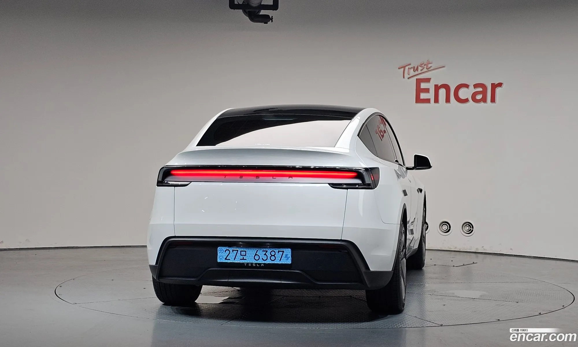 Tesla Model Y 2025 LRWYGCFJXSC053450 — 29