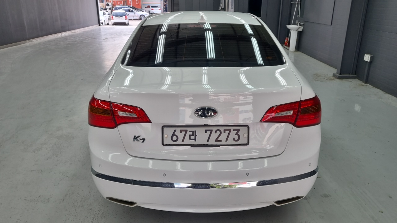 Kia K7 2011 — 2
