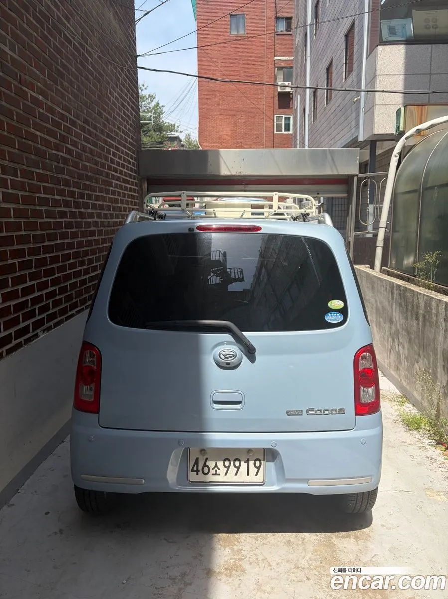 Daihatsu Mira Cocoa 2010 — 5