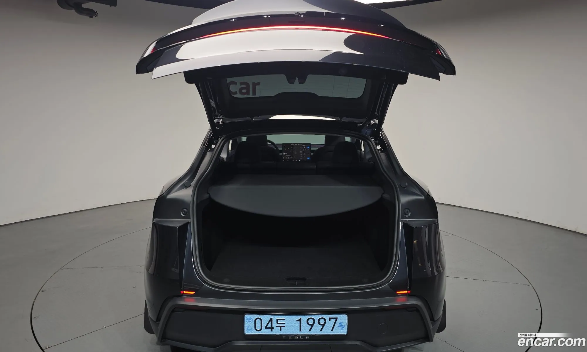 Tesla Model Y 2025 LRWYGCFJ7SC349865 — 4