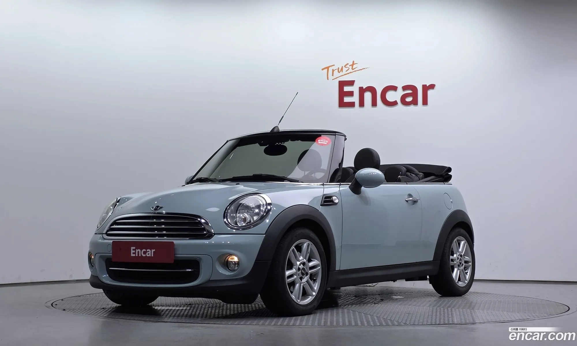 Mini Cooper Convertible 2014 WMWZN3108ET656796 — 2