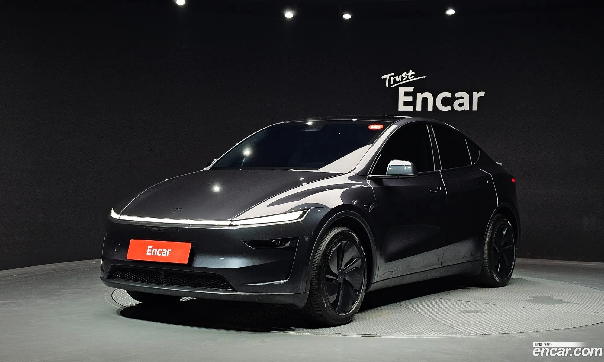 Tesla Model Y 2025 LRWYGCFJXSC214833 — 4
