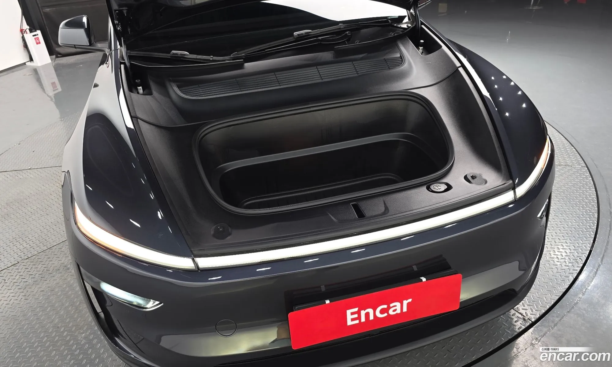 Tesla Model Y 2025 LRWYGCFJ1SC076387 — 31