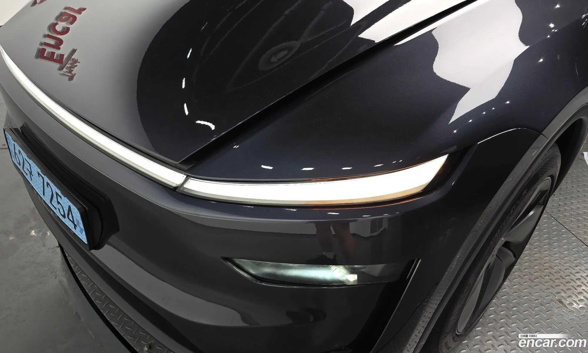 Tesla Model Y 2025 LRWYGCFJ1SC076387 — 25