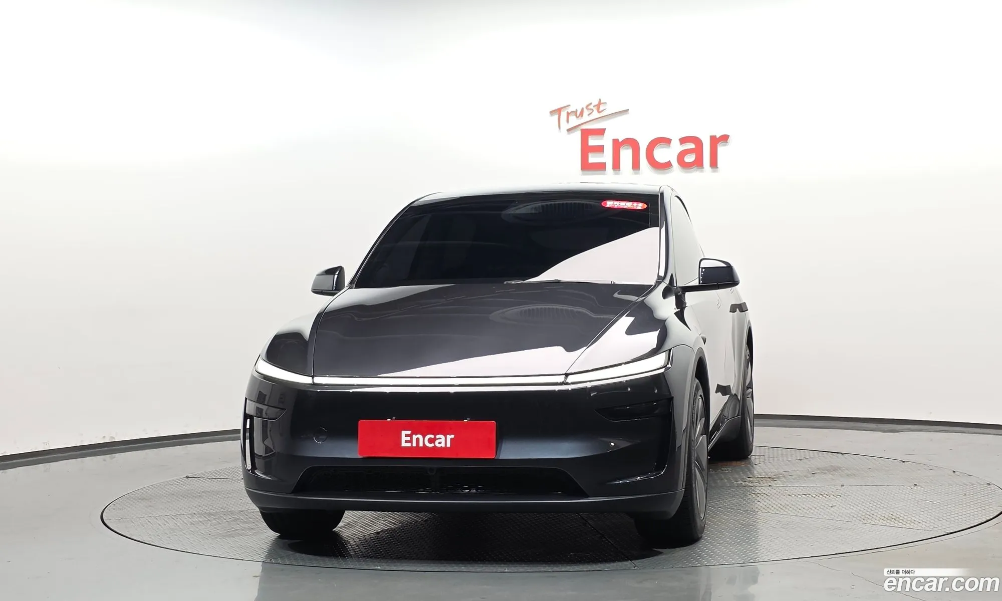 Tesla Model Y 2025 LRWYGCFJ1SC076387 — 32
