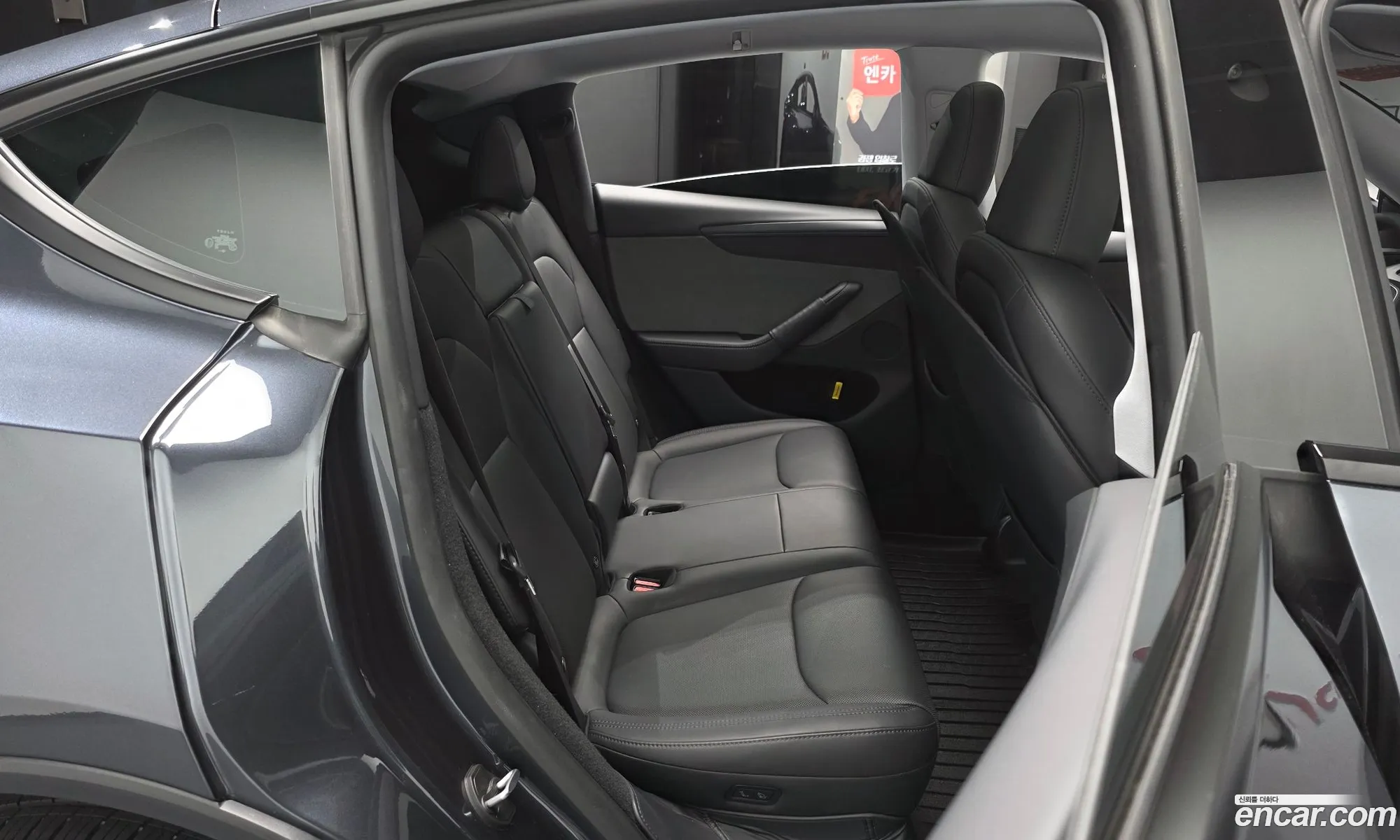 Tesla Model Y 2025 LRWYGCFJ1SC076387 — 4