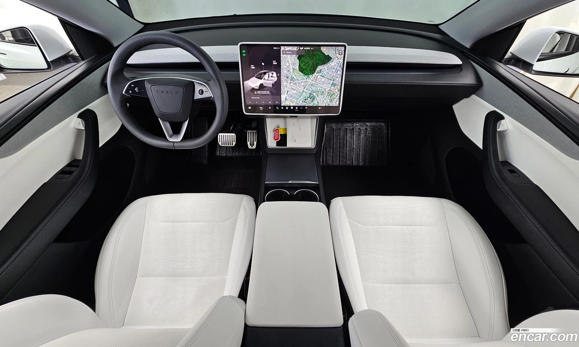 Tesla Model Y 2025 LRWYGCFJ9SC101102 — 23