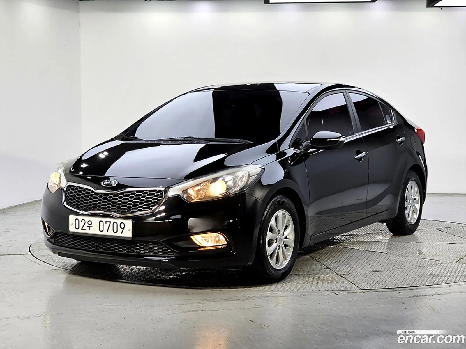 Kia K3 2015 — 4