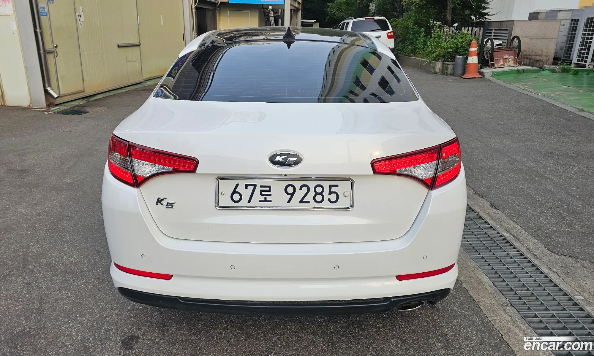 Kia K5 2010 — 2