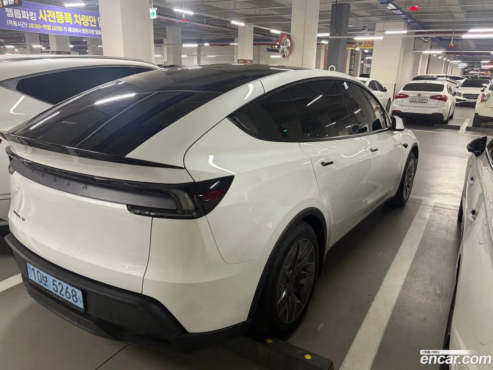 Tesla Model Y 2026 — 7