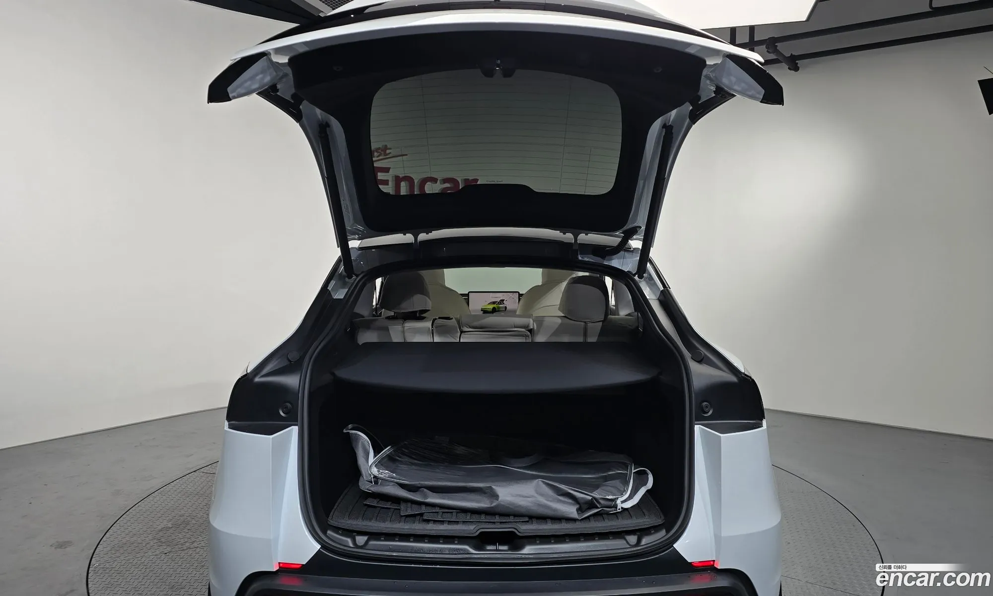 Tesla Model Y 2025 LRWYGCFJ0SC341803 — 28