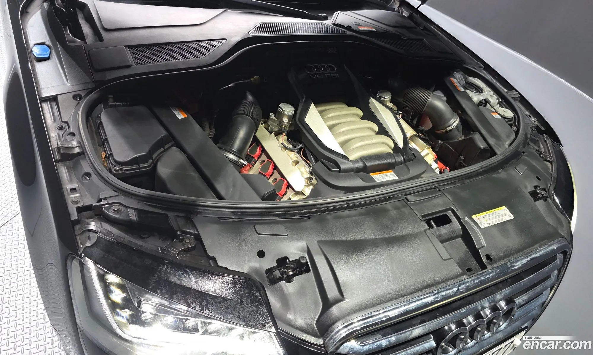 Audi A8 2012 WAUZZZ4H7CN013625 — 6