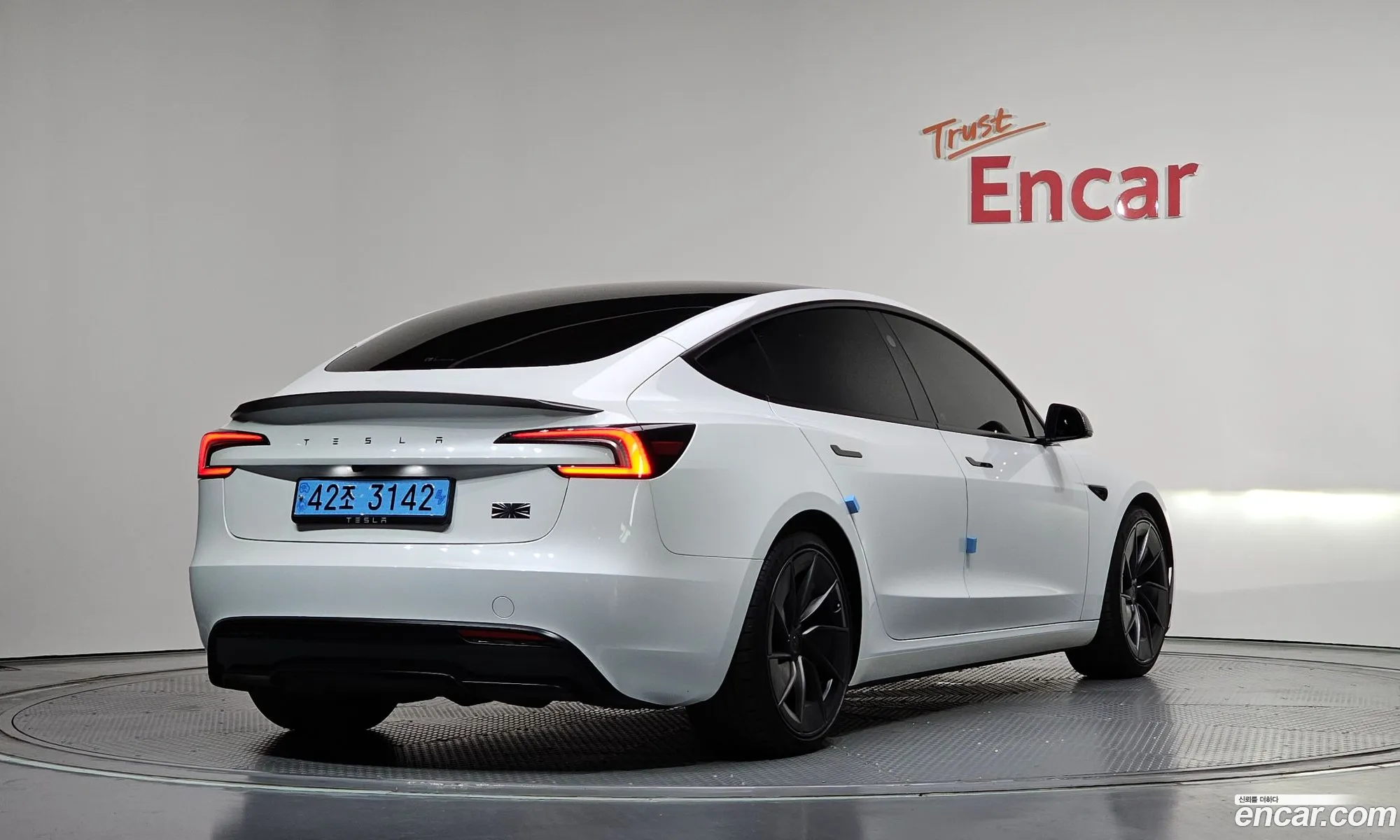Tesla Model 3 2024 LRW3E7ETXRC191140 — 14