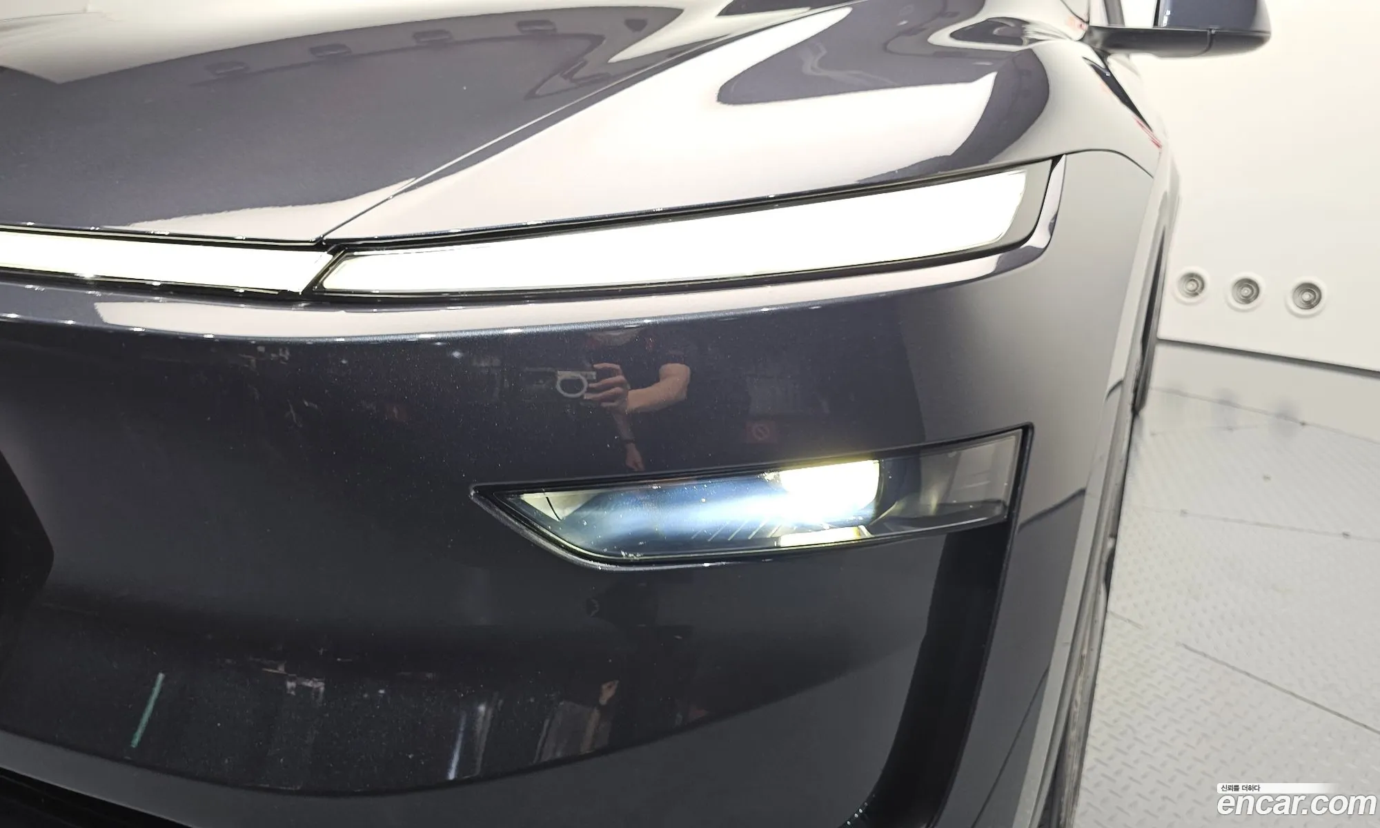 Tesla Model Y 2025 LRWYGCFJ1SC239751 — 32