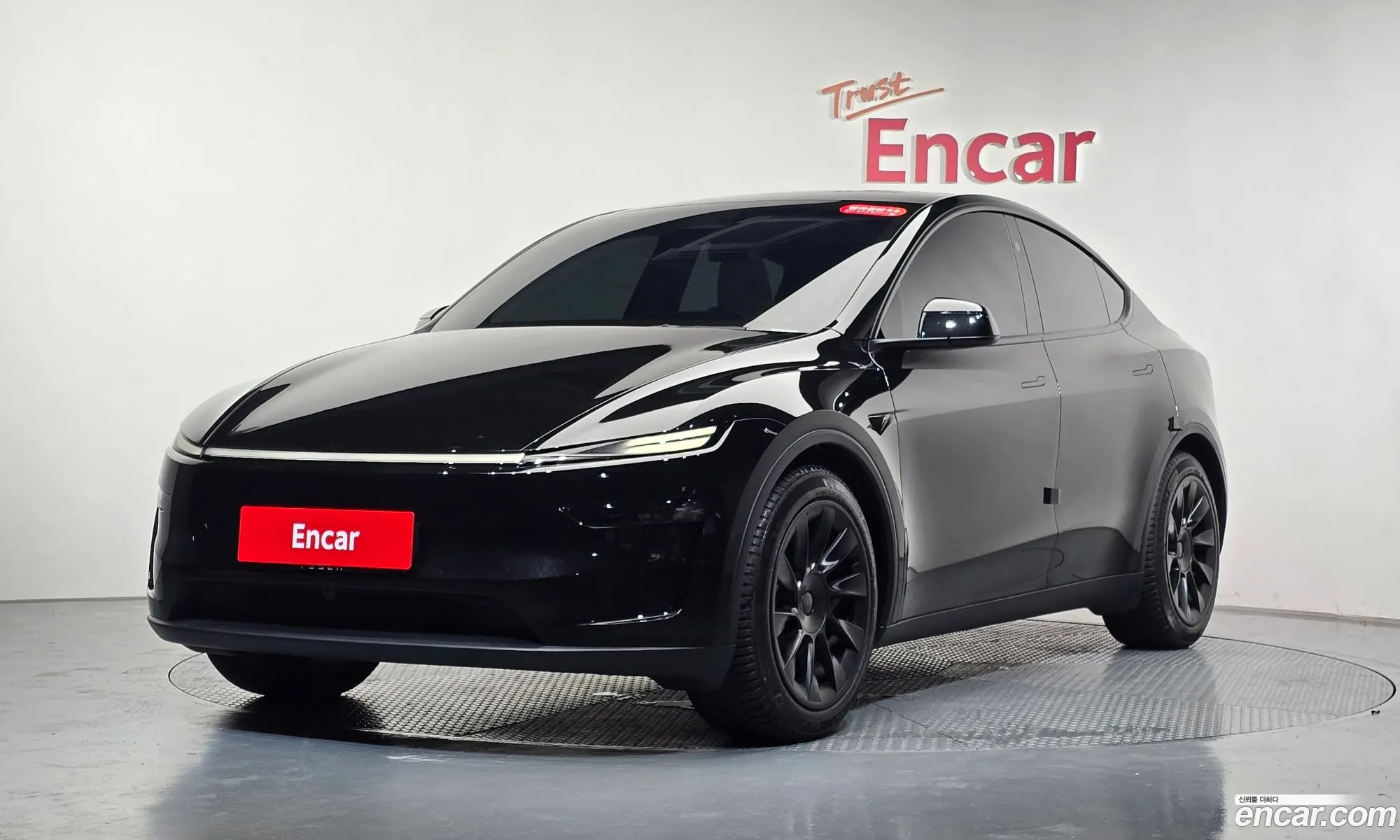 Tesla Model Y 2025 LRWYGCFJ0SC237375 — 34