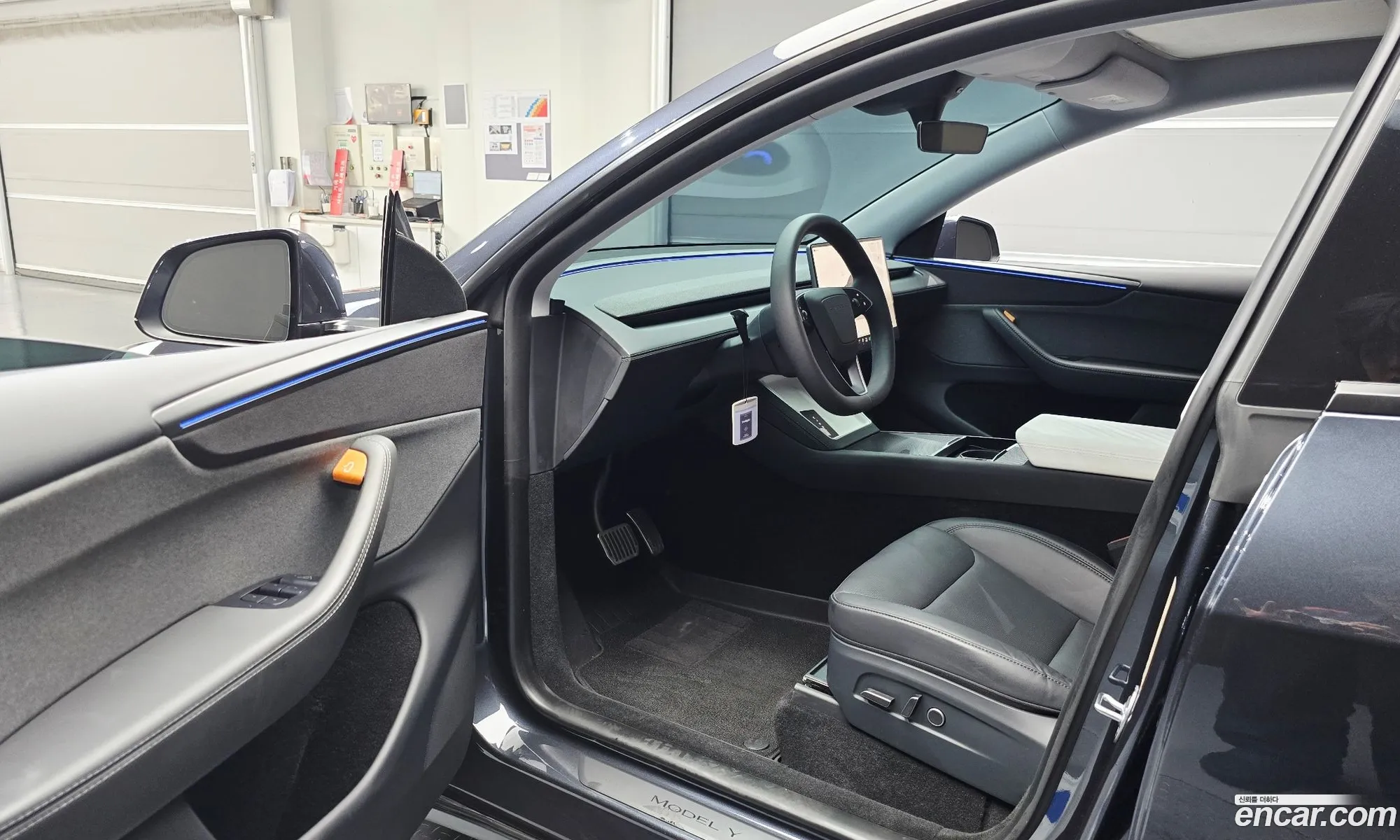 Tesla Model Y 2025 LRWYGCFJ1SC104043 — 14